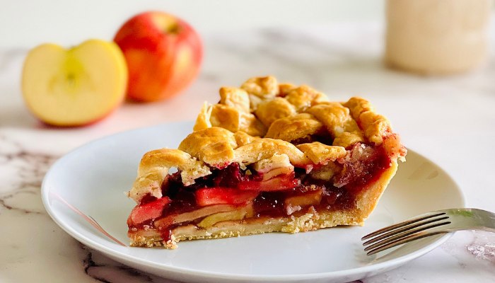 slice of apple cranberry pie