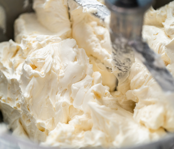 https://mirjamskitchenyodel.com swiss meringue buttercream mixing close up 