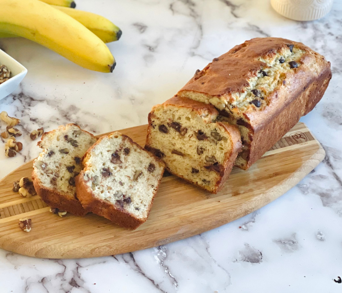 https://mirjamskitchenyodel.com banana bread with walnuts cut in slices