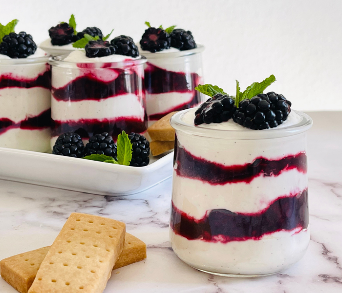https://mirjamskitchenyodel.com blackberry fool close up with shortbread next to it