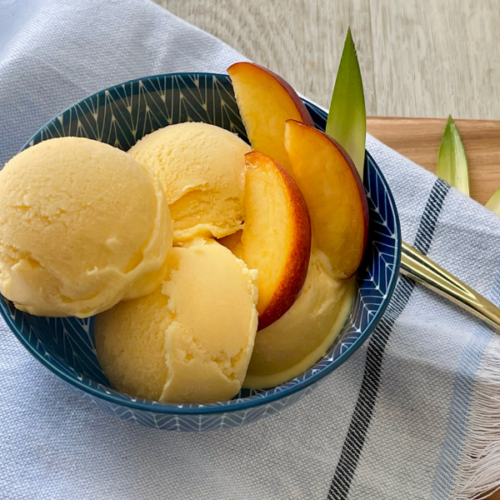 https://mirjamskitchenyodel.com peach ice cream close up