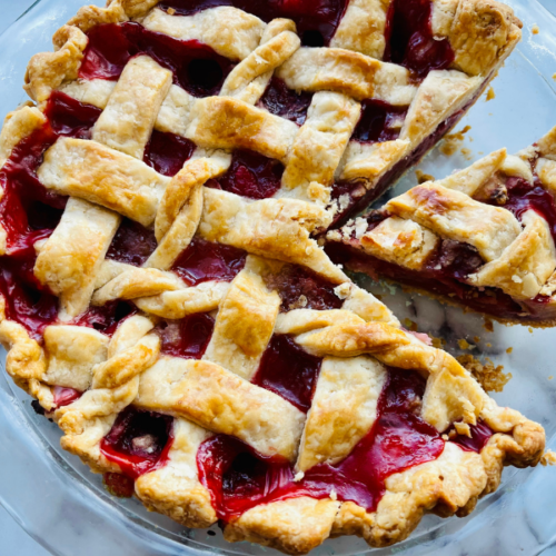 https://mirjamskitchenyodel.com strawberry rhubarb pie close up