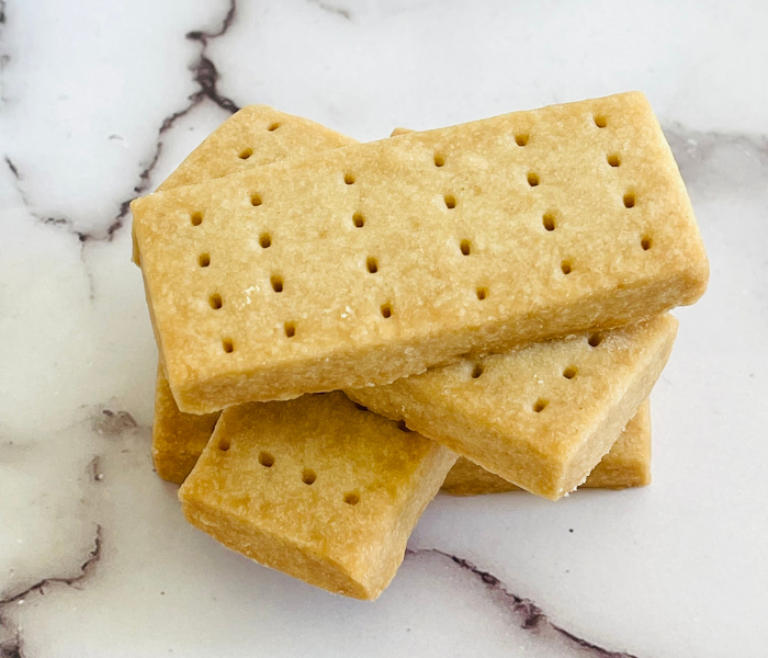 https://mirjamskitchenyodel.com shortbread cookies close up with poked holes