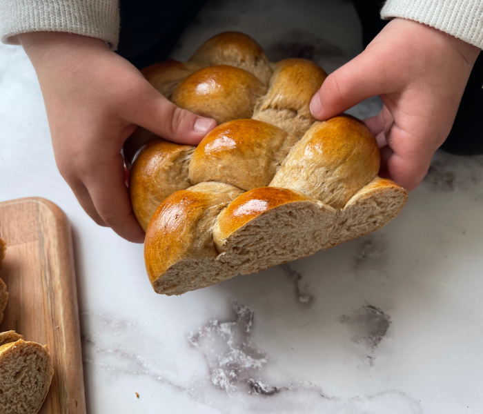 https://mirjamskitchenyodel.com braided bread with kids hands