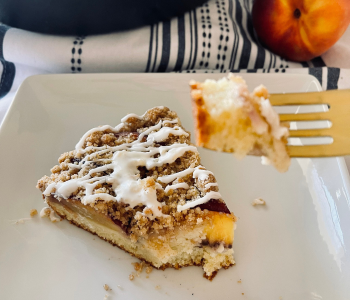 https://mirjamskitchenyodel.com eating peach crumb coffee cake