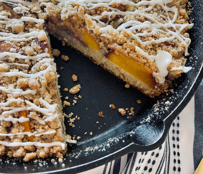 https://mirjamskitchenyodel.com peach crumb coffee cake slice cut out