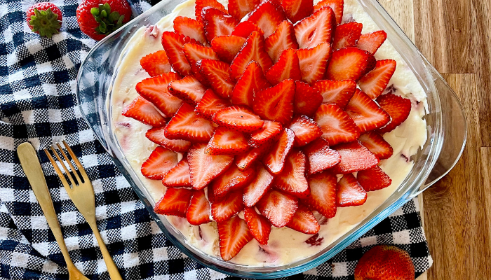 http://mirjamskitchenyodel.com strawberry tiramisu with gold spoon & fork, and strawberries