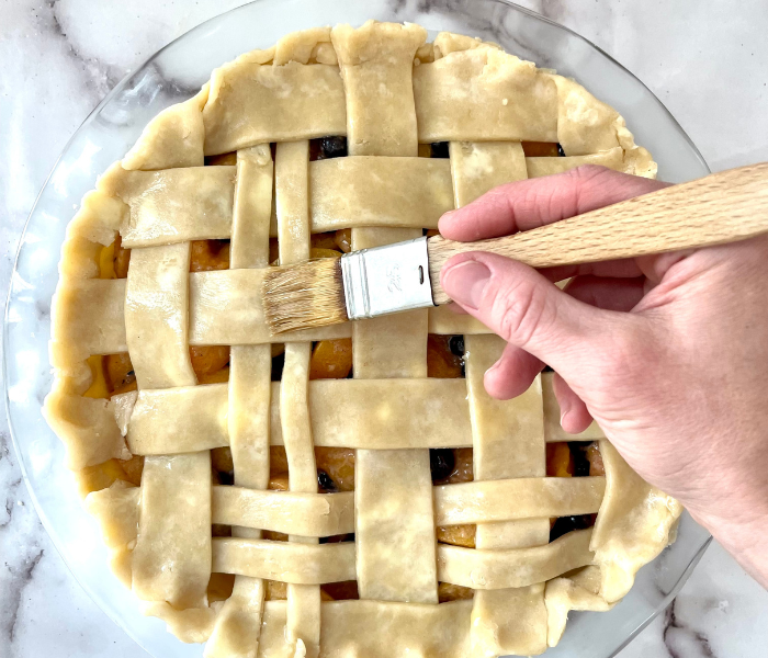 https://mirjamskitchenyodel.com brushing pie crust with egg wash