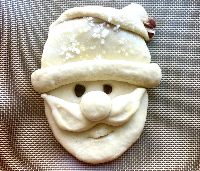 https://mirjamskitchenyodeel.com sweet bread santa head before baking