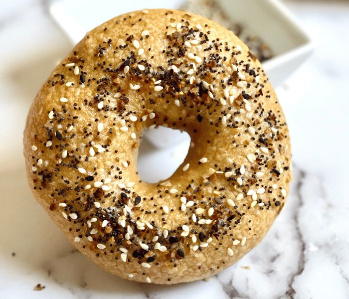 https://mirjamskitchenyodel.com close up of an everything bagel