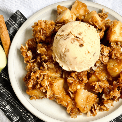 https://mirjamskitchenyodel.com apple cinnamon crisp with a scoop of ice cream