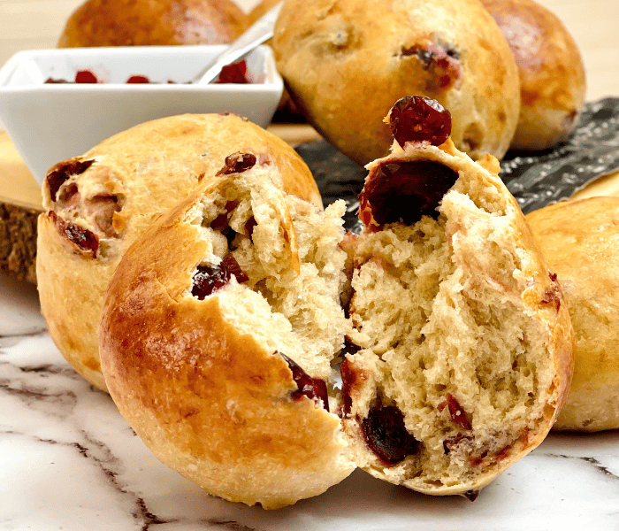 https://mirjamskitchenyodel.com no-knead breakfast rolls with cranberries opened up