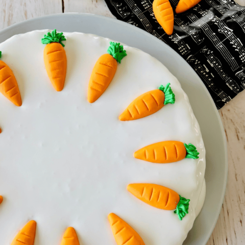 https://mirjamskitchenyodel.com close up of the cake and fondant carrots